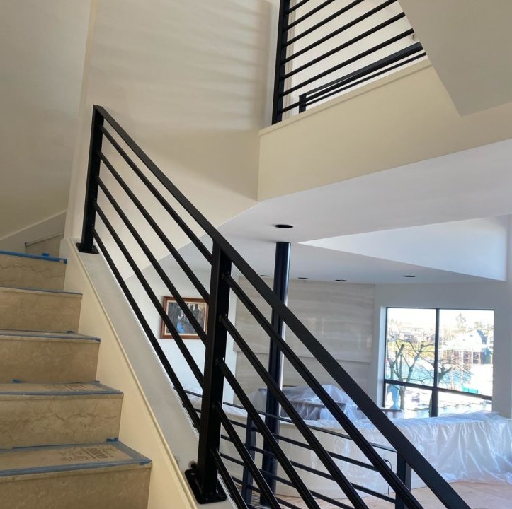 custom welding of stair railings and deck railings fabrication